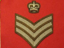 NUMBER 2 DRESS FAD SSGT CSGT CHEVRON AND CROWN ON FAD BROWN BADGE