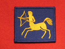 TACTICAL RECOGNITION FLASH BADGE 7TH AIR DEFENCE REGIMENT GOLD AND BLUE TRF BADGE