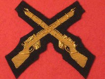 NUMBER 1 DRESS CROSSED RIFLES SKILL AT ARMS GOLD ON DARK BLUE BADGE